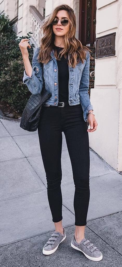 Jean jacket with white pants on Stylevore