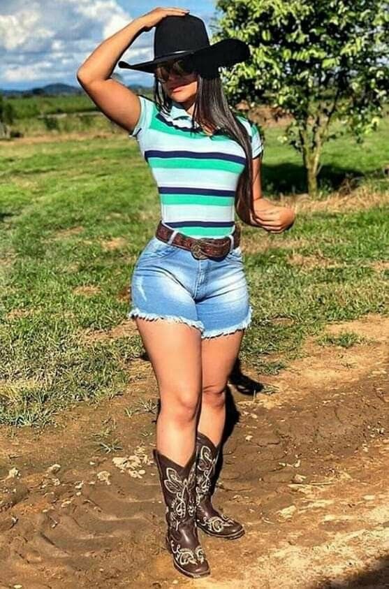 Modern Cow Girl Outfit With Shorts and boots on Stylevore