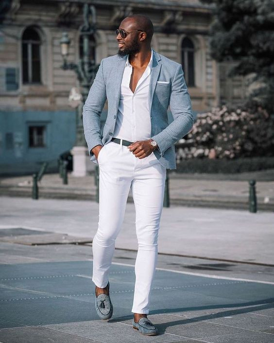 blue blazer and white trousers