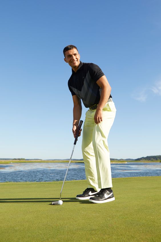 Black Polo-shirt, Golf Wardrobe Ideas With White Formal Trouser, Golfer: 